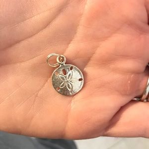 Sterling silver sand dollar charm